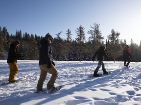 A group of snowshoers brave the cold at Whitemud Park on Monday, Dec. 27, 2021. Arctic air is causing extreme cold weather in Edmonton.