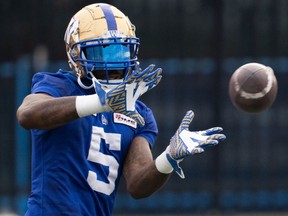 Winnipeg Blue Bombers defensive lineman Willie Jefferson (5) catches a pass during practice in Hamilton, Ont., Friday, Dec. 10, 2021. Winnipeg will meet the Hamilton Tiger-Cats in the 108th CFL Grey Cup game.THE CANADIAN PRESS/Ryan Remiorz