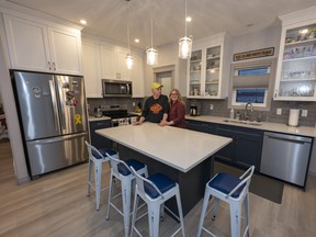 John Russell and Mernie Greenwood named their Presley model laned house by Western Living Homes "Elvis."