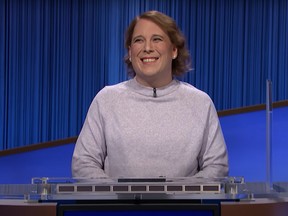 Screen shot of Amy Schneider who got her 21st win in row making her Jeopardy winningest woman.