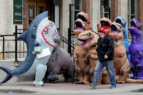 An inflatable shark, triceratops, and eight T-Rex wait to cross the street as they parade down Whyte Avenue in Edmonton on April 4, 2021. I have no idea what is going on here but it is a good example of why I try and have a camera beside me whenever I’m driving through the city.