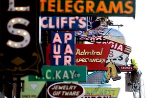 With COVID-19 disrupting pretty much every event and people hunkering down at home, I spent many shifts searching for something, anything, to photograph. Because of this a majority of my favourite photos this year are of found moments. Crews from Blanchett Neon work on Edmonton’s Neon Sign Museum along 104 Street on May 4, 2021.