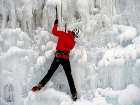Zach Kettner climbs the ice wall at the Edmonton Ski Club on Sunday December 19, 2021. The wall was built by members of the Alpine Club of Canada Edmonton Section to promote the sport of ice climbing and service existing local ice climbers. It is open 7 days a week and climbing instruction is also offered. (PHOTO BY LARRY WONG/POSTMEDIA)