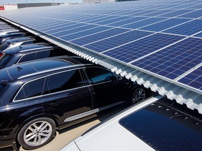 Solar panels cover vehicle shelters at Royal Oak Audi in Calgary on July 29, 2019.