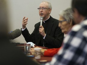 Edmonton Archbishop Richard Smith takes part in a press conference where Angelina (Angie) Crerar and Gary Gagnon were introduced as Alberta indigenous delegates who will travel to Vatican City this month to meet with Pope Francis, in Edmonton Thursday Dec. 2, 2021. Photo by David Bloom