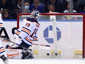 Mikko Koskinen (19) of the Edmonton Oilers is beaten by Ryan Strome (16) of the New York Rangers at Madison Square Garden on Monday, Jan. 03, 2022, in New York City. The Rangers defeated the Oilers 4-1.