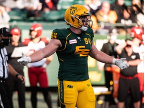 Edmonton Elks defensive tackle Jake Ceresna (94) reacts to a referee’s call as he plays the Calgary Stampeders at Commonwealth Stadium in Edmonton, on Sept. 11, 2021.