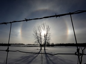 A sundog appears over a field in south east Edmonton on Tuesday, Jan. 4, 2022. Edmonton is currently under an extreme cold warning. Photo by David Bloom