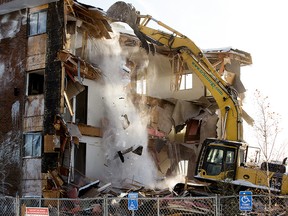Crews demolish the Eben – Ezer Senior Citizens’ Home 1, 10125 85 Avenue, to make way for a new 133 unit building in Edmonton on Tuesday, Jan. 4, 2022. Photo by David Bloom