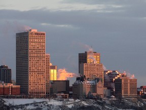 Downtown Edmonton is seen from Saskatchewan Drive at sunrise during an extreme cold warning on Thursday, Jan. 6, 2022. Photo by Ian Kucerak