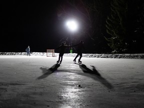 Skaters take advantage of the warm winter weather to skate at Rundle Park IceWay in Edmonton on Tuesday, January 11, 2022. Photo by Ian Kucerak