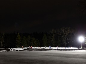 Skaters take advantage of the warm winter weather to skate at Rundle Park IceWay in Edmonton on Tuesday, January 11, 2022. Photo by Ian Kucerak