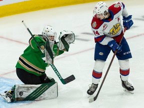 Edmonton Oil Kings’ Josh Williams watches Prince Albert Raiders’ goaltender Tikhon Chaika make a save during second period WHL action at Rogers Place in Edmonton, on Tuesday, Jan. 18, 2022.