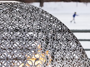 A skater enjoys a warm afternoon of skating on the rink at Hawrelak Park in Edmonton, on Tuesday, Jan. 25, 2022.