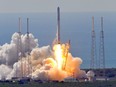 Space X's Falcon 9 rocket as it lifts off from space launch complex 40 at Cape Canaveral, Florida June 28, 2015 with a Dragon CRS7 spacecraft.