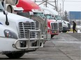 Transport trucks parked at the Road King truck stop in Calgary on April 2, 2020.