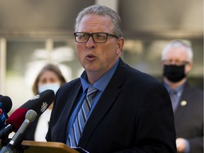 Edmonton Catholic’s chief superintendent Robert Martin said schools will continue using the three-case benchmark while they wait for Alberta Education to provide an update.