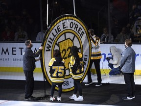 Former Boston Bruins player Willie O’Ree has his number retired and raised to the rafters prior to a game against the Carolina Hurricanes at TD Garden on Tuesday, Jan. 18, 2022.