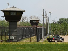 A corrections vehicle drives around the outside fence at the Edmonton Institution, 21611 Meridian Street. Two Muslim community groups are calling on the Correctional Service to end the "privatization" of religious chaplain services.