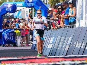 Paula Findlay of Edmonton crosses the finish line at the Ironman 70.3 Indian Wells La Quinta on Dec. 14, 2019.