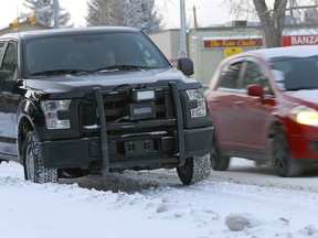 A photo radar truck nabs speeders in a playground zone on 20th Avenue between 10th Street and 9th Street N.W. in Calgary on Wednesday, January 5, 2022.