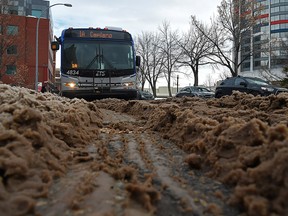 With the warmer temperatures on the way, the roads are heavily congested with snow-thick cement in downtown Edmonton on January 11, 2022. Ed Kaiser / Postmedia