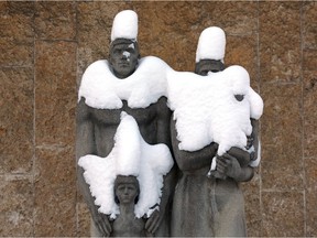 Snow covered statues at the former Royal Alberta Museum site, 12845 102 Ave., in Edmonton on Saturday, Jan. 8, 2022.