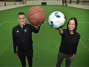 Brandon Brock, operations manager for Free Play for Kids, and Sharon Yeo, Catholic Social Services' director of immigration and settlement services, at the Overlander Park soccer centre in Edmonton, Wednesday, Jan. 26, 2022.