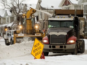 City of Edmonton crews remove snow from the roads in Edmonton's Griesbach neighbourhood, on Friday, Jan. 21, 2022.
