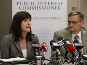 Information and Privacy Commissioner Jill Clayton and Public Interest Commissioner Peter Hourihan discuss the opening of a joint investigation into the alleged improper destruction of records by a Government of Alberta ministry, in Edmonton, Alta. on Wednesday May 13, 2015.
