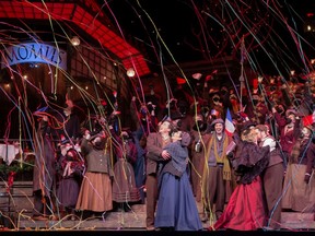 The bohemians, friends and revelers outside the Café Momus in Paris' Latin Quarter, in Edmonton Opera's production of Puccini's La Bohème, which opened Feb. 5 in the Jubilee Auditorium.