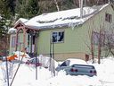 The home of accused hitman Gene Lahrkamp, at 2000 Lookout St. in Trail, was searched by police on Feb. 15. His whereabouts are unknown.