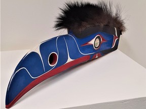 Underwater Raven, woodcarving with acrylic, shell and fur, at Art Gallery of St. Albert.