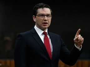 Conservative MP Pierre Poilievre rises during Question Period in the House of Commons on Parliament Hill in Ottawa on Friday, April 16, 2021