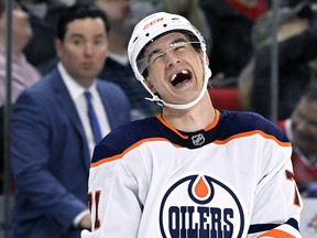 Ryan McLeod #71 of the Edmonton Oilers laughs during the second period of their game against the Carolina Hurricanesat PNC Arena on February 27, 2022 in Raleigh, North Carolina.