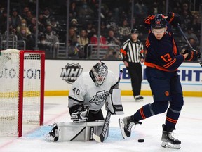 LA Kings goaltender Cal Petersen (40) defends the goal against Edmonton Oilers right wing Jesse Puljujarvi (13) in the first period at Crypto.com Arena.