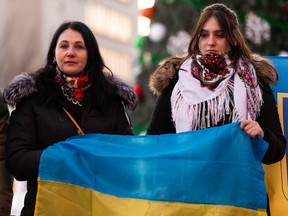 Edmonton's Ukrainian community came out to witness the raising of the flag of Ukraine at the Alberta legislature in Edmonton on Friday, Feb. 25, 2022 as the nation fights an invasion by Russia.