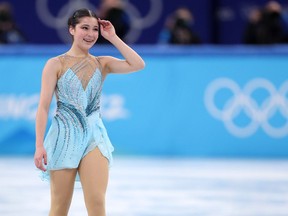 Alysa Liu of Team United States reacts after skating during the Women Single Skating Free Skating on day thirteen of the Beijing 2022 Winter Olympic Games at Capital Indoor Stadium on February 17, 2022 in Beijing, China.