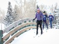 Elise Konoff and her children Justin, 14, and Jenna, 12,  enjoy a brisk cross-country ski at Confederation Park Golf Course. The Konoff family prepares and trains to ski Foothills Nordic Ski Club's own loppet, the Cookie Race.   CHRISTINA RYAN