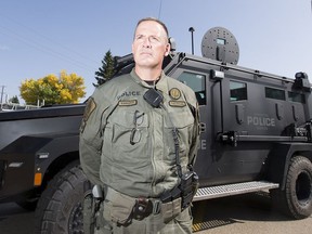 Sgt. Rick Abbott in front of the new Armoured Rescue Vehicle, ARV2 on Sept. 16, 2020 in Edmonton.
