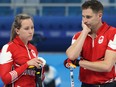 John Morris of Canada and Rachel Homan of Canada react after losing the game.