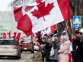 Trucker convoy supporters protest COVID-19 health measures at the Alberta Legislature in Edmonton on Saturday Feb. 12, 2022.