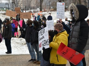 Students in favour of wearing masks in school held a rally near the Alberta Legislature in Edmonton, February 14, 2022.