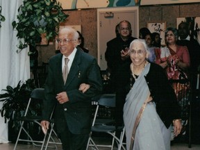 Gajanan Pundit and his wife Dewayani Pundit celebrate a family wedding in Edmonton in 2004.