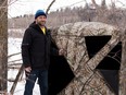 Stealth camper Steve Wallis sets up a hunting hide in Edmonton's Buena Vista Park .