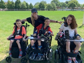 Mother, Dana Geall (center back), and her triplets, Cole Florence (center front), Brody Florence (left) and sister Taylor Florence (right). Courtesy Dana Geall