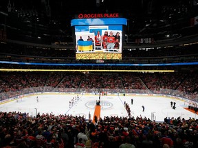 Axios Ukrainian Men's Ensemble sings the Ukraine and Canada national anthems before the Edmonton Oilers play the Montreal Canadiens during an NHL game at Rogers Place in Edmonton, on Saturday, March 5, 2022.