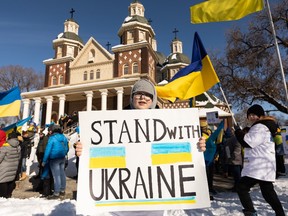 Marchers called for a No Fly Zone in Ukraine to ground the  Russian Air Force during the Alberta Stands With Ukraine, Walk for No Fly Zone event in Edmonton, on Sunday, March 6, 2022. Members of the Ukrainian community walked from St Josaphat's Ukrainian Catholic Cathedral to Churchill Square. Photo by Ian Kucerak