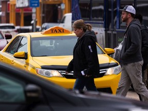 A Yellow Cab taxi is seen in downtown Edmonton, on Saturday, March 5, 2022. Photo by Ian Kucerak