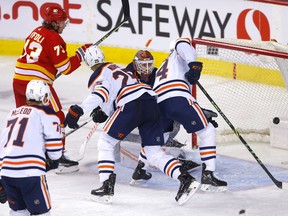 Calgary Flames Tyler Toffoli scores on Edmonton Oilers goalie Mikko Koskinen in second period NHL action at the Scotiabank Saddledome in Calgary on Monday, March 7, 2022. Darren Makowichuk/Postmedia